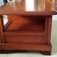 Louis Philippe style coffee table in cherry wood with large drawers.