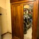 Oak wood cabinet with mirror, red velvet carpeted inside