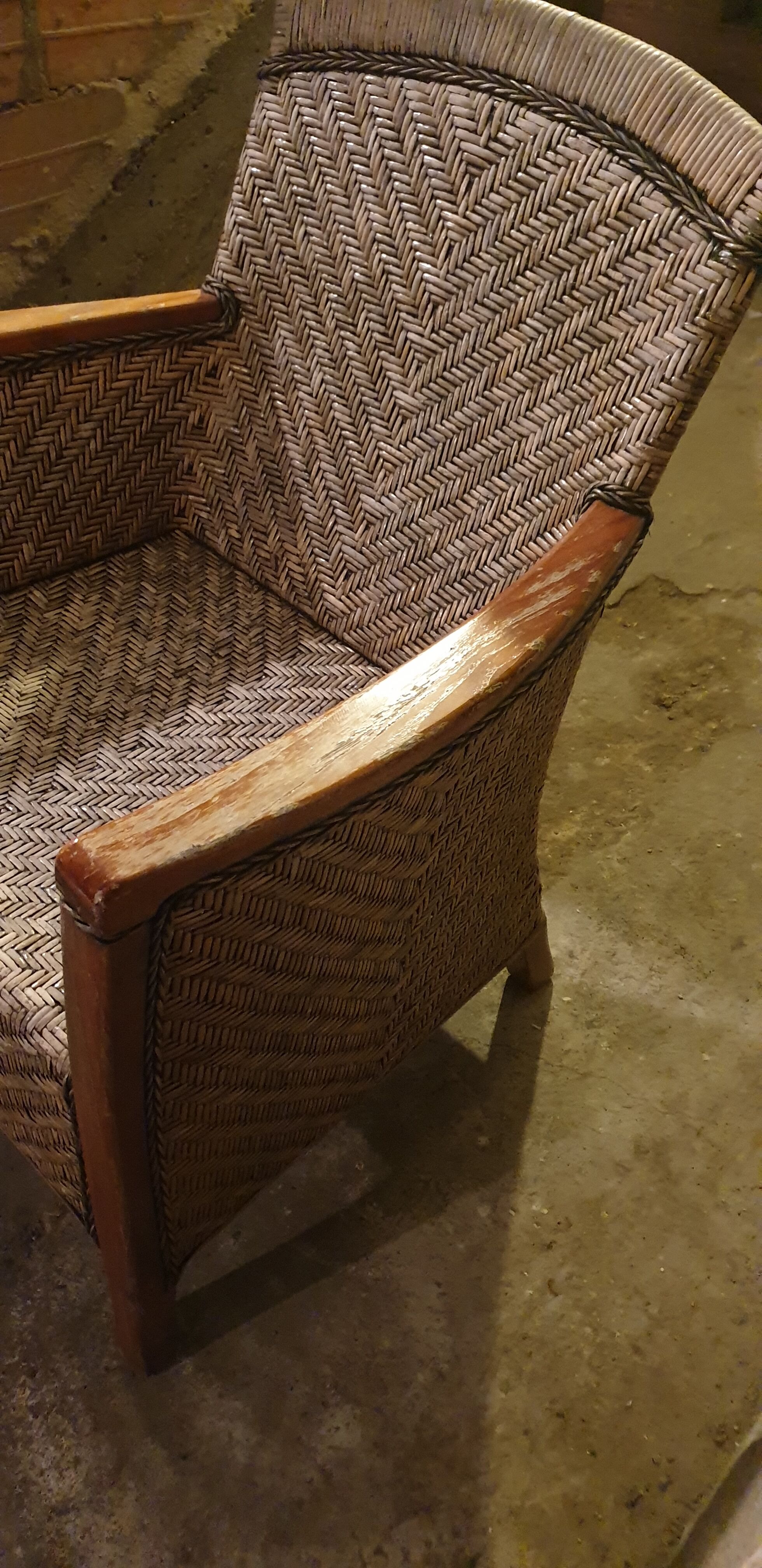 Rattan and wood armchair