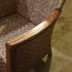 Rattan and wood armchair