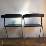 Arch folding chairs
