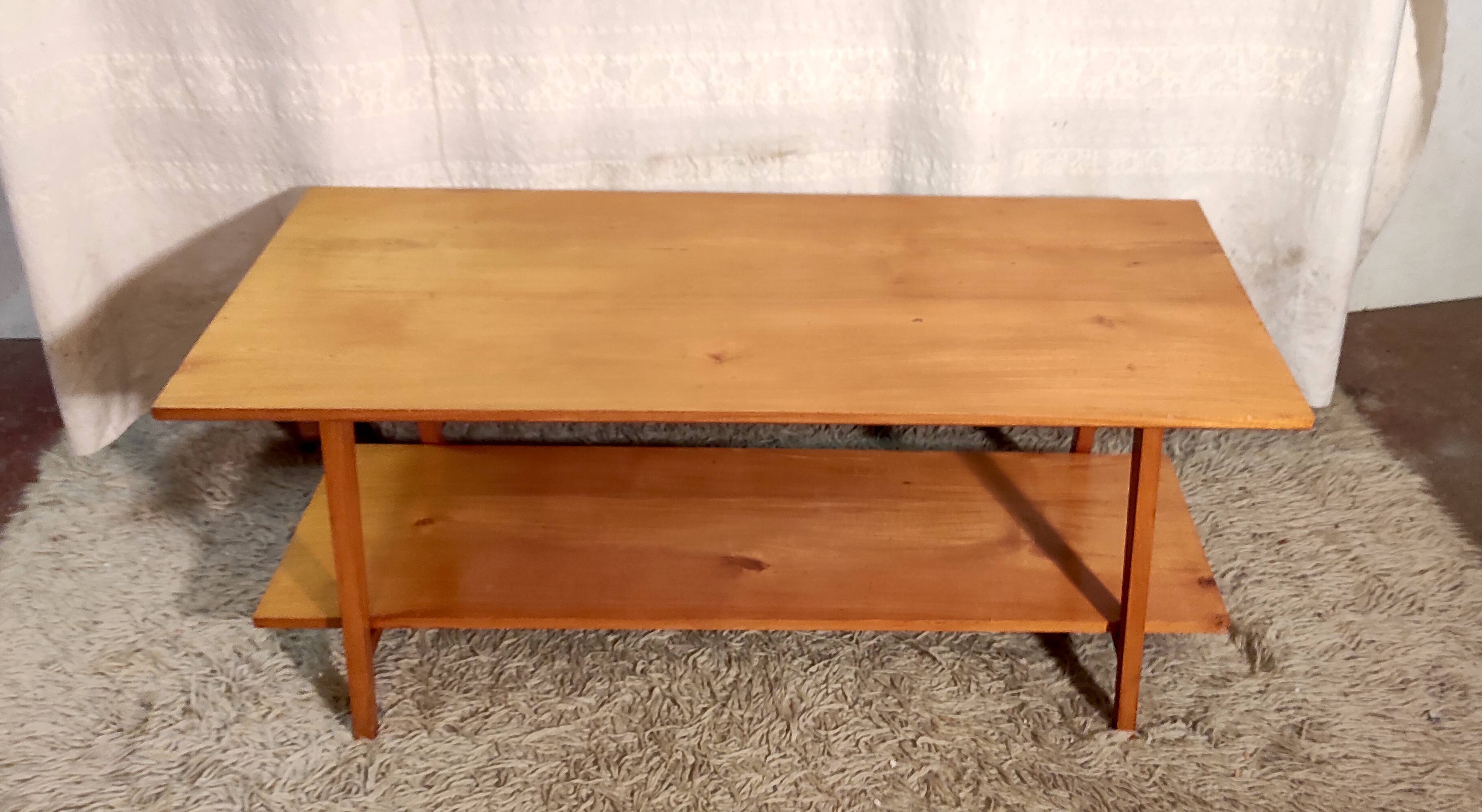Solid wood coffee table with tapered legs - mid 20th century.