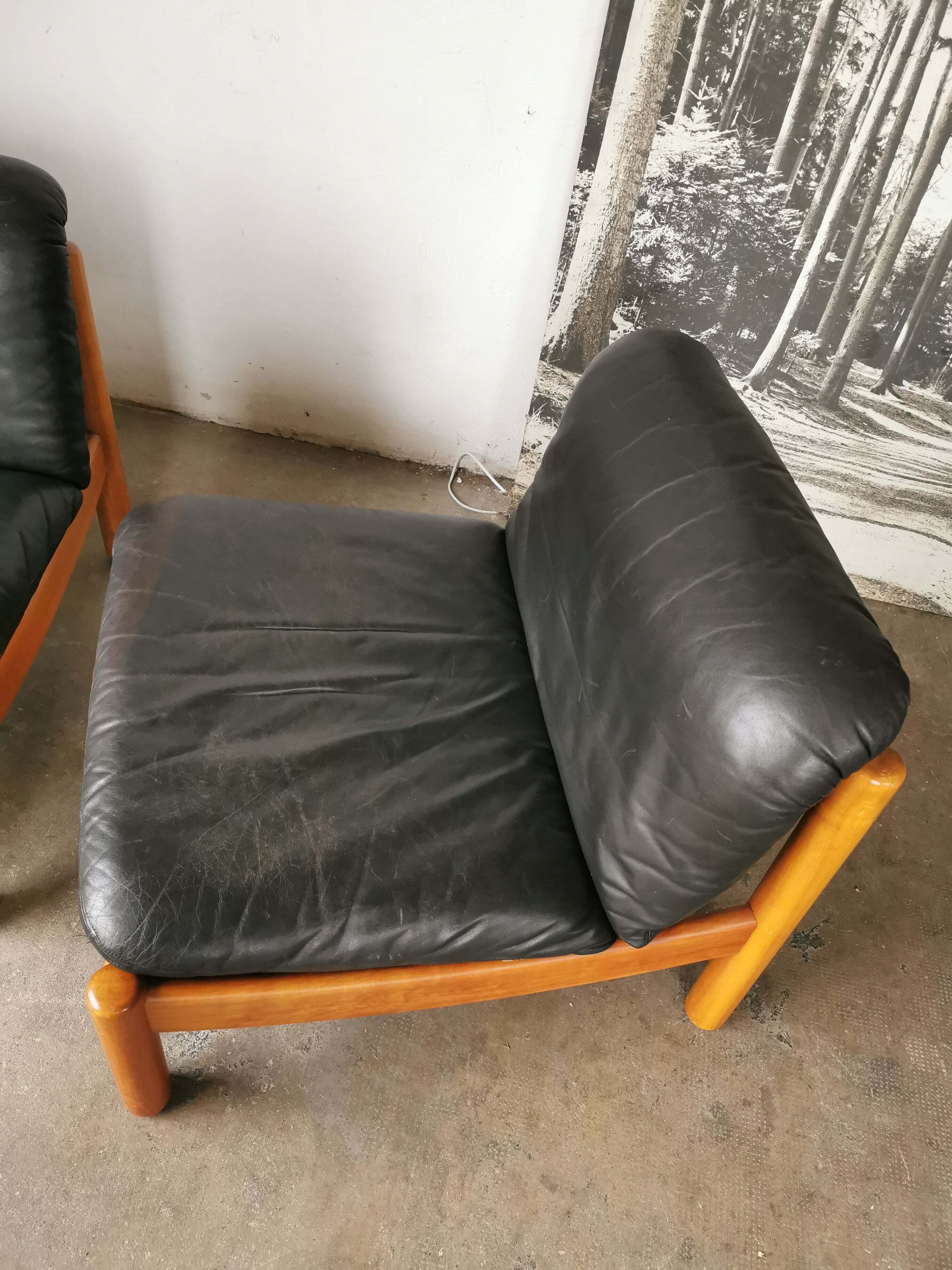 Pair of designer leather armchairs 80s