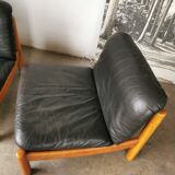 Pair of designer leather armchairs 80s