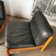 Pair of designer leather armchairs 80s