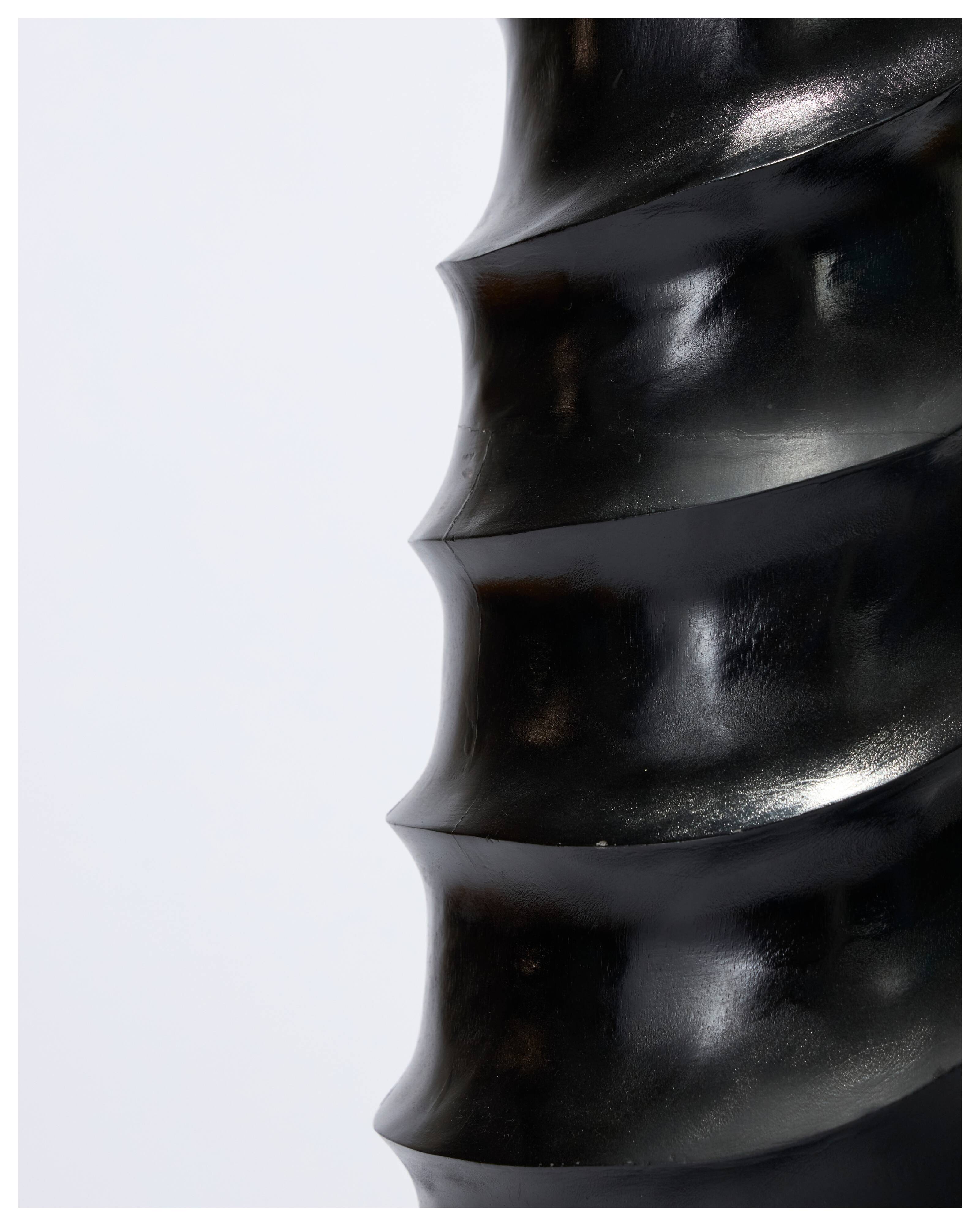 Set of 3 large black vases made of wood and black lacquered.