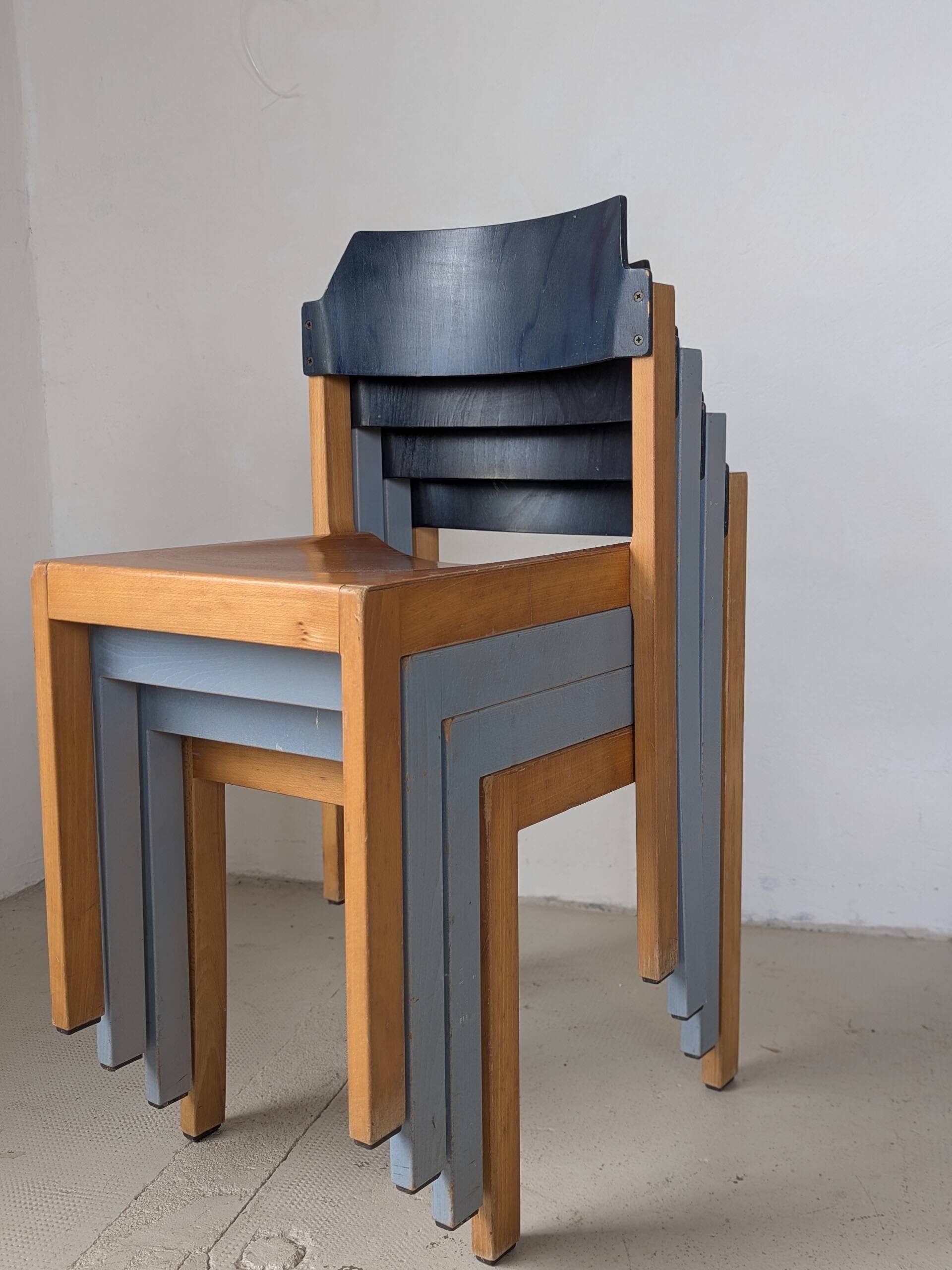 Set of 4 stackable chairs by Rainer Schell