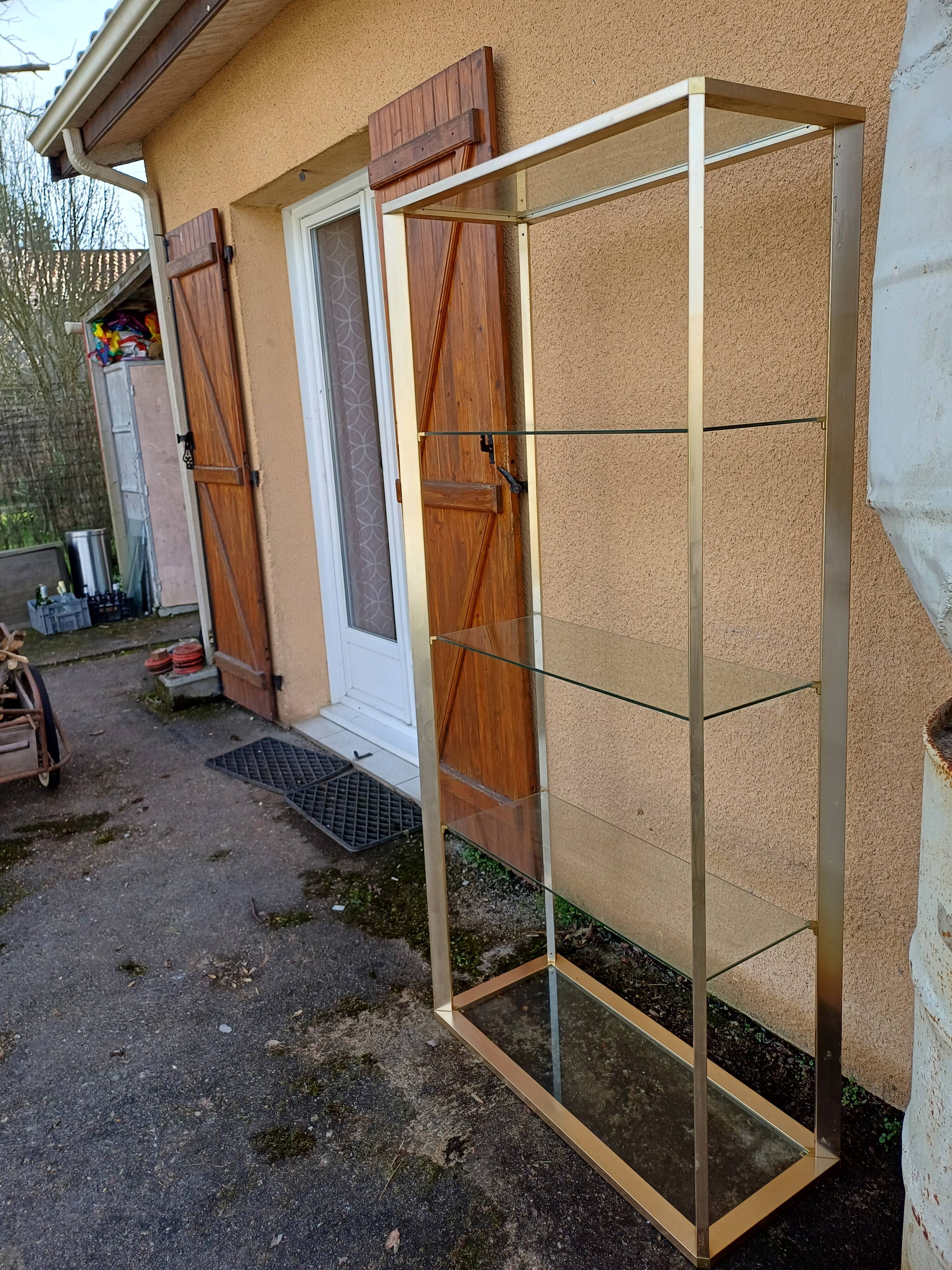 Vintage shelving unit in gold aluminum and glass