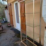 Vintage shelving unit in gold aluminum and glass