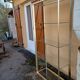 Vintage shelving unit in gold aluminum and glass