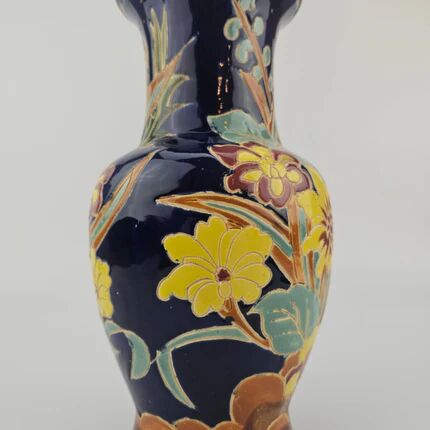 Large multicoloured ceramic vase with floral decoration signed NT.