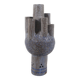 Sculpture en céramique avec des motifs circulaires et une signature.