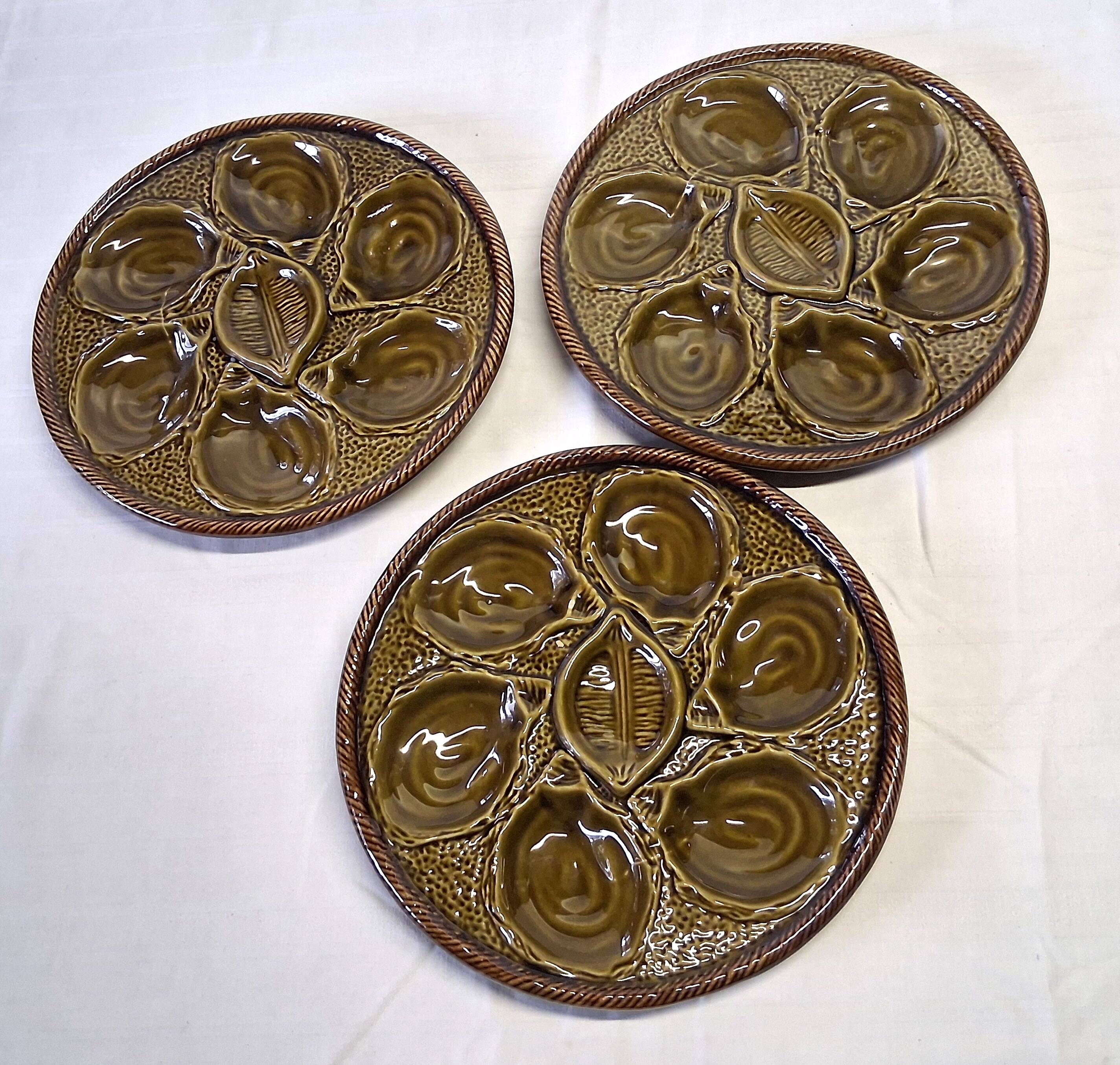 3 green majolica oyster plates from St Clément in good condition.