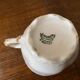 Cup and saucer Limoge porcelain decoration frieze of roses