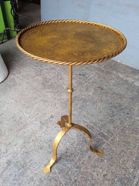 Minimalist brutalist gold metal pedestal table