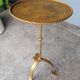 Minimalist brutalist gold metal pedestal table