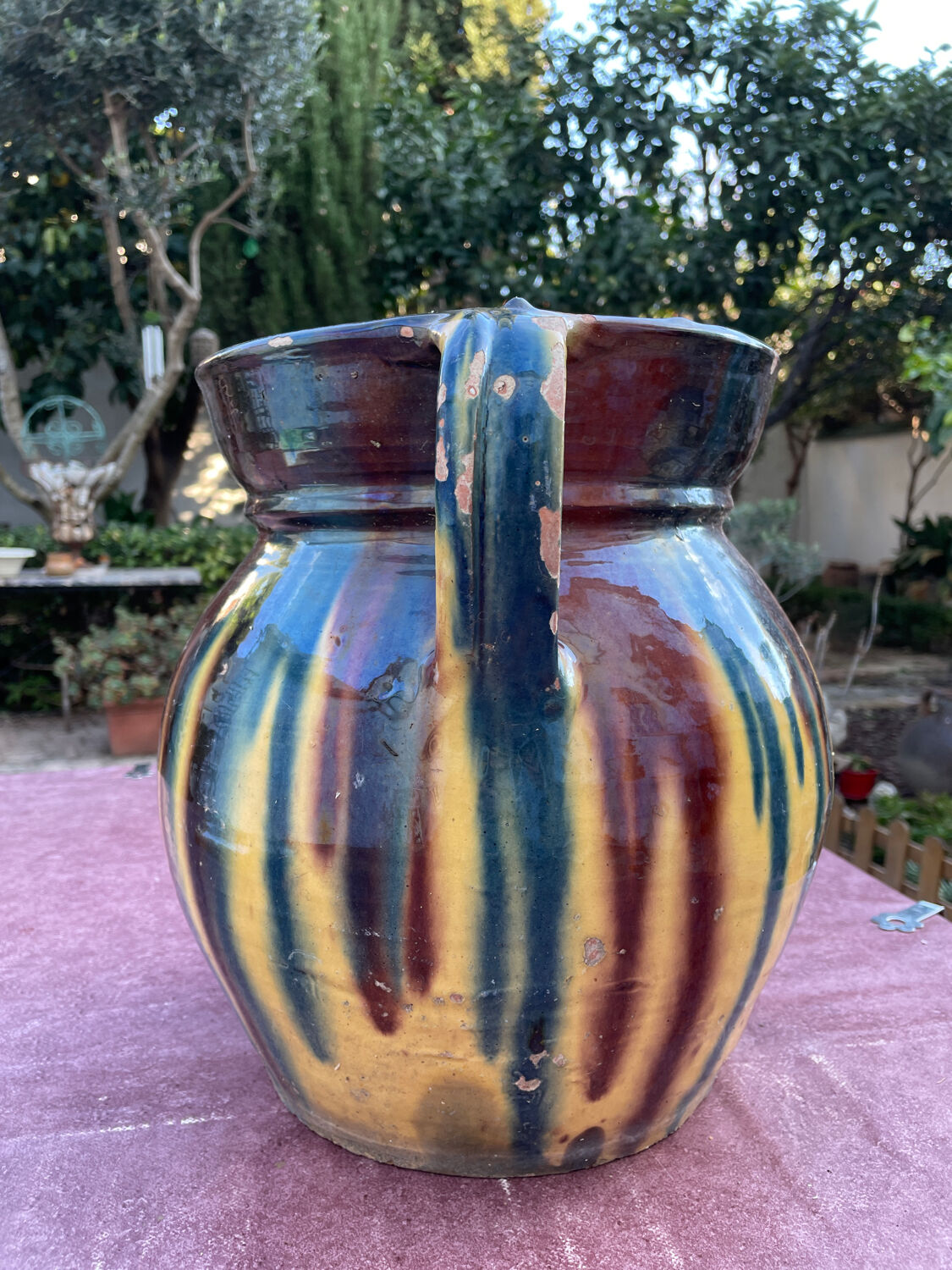 Old flower jar with two glazed earth handles