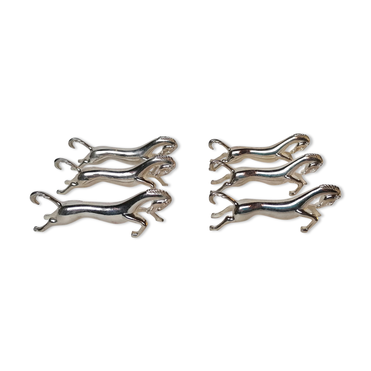 6 porte-couteaux métal argenté forme cheval