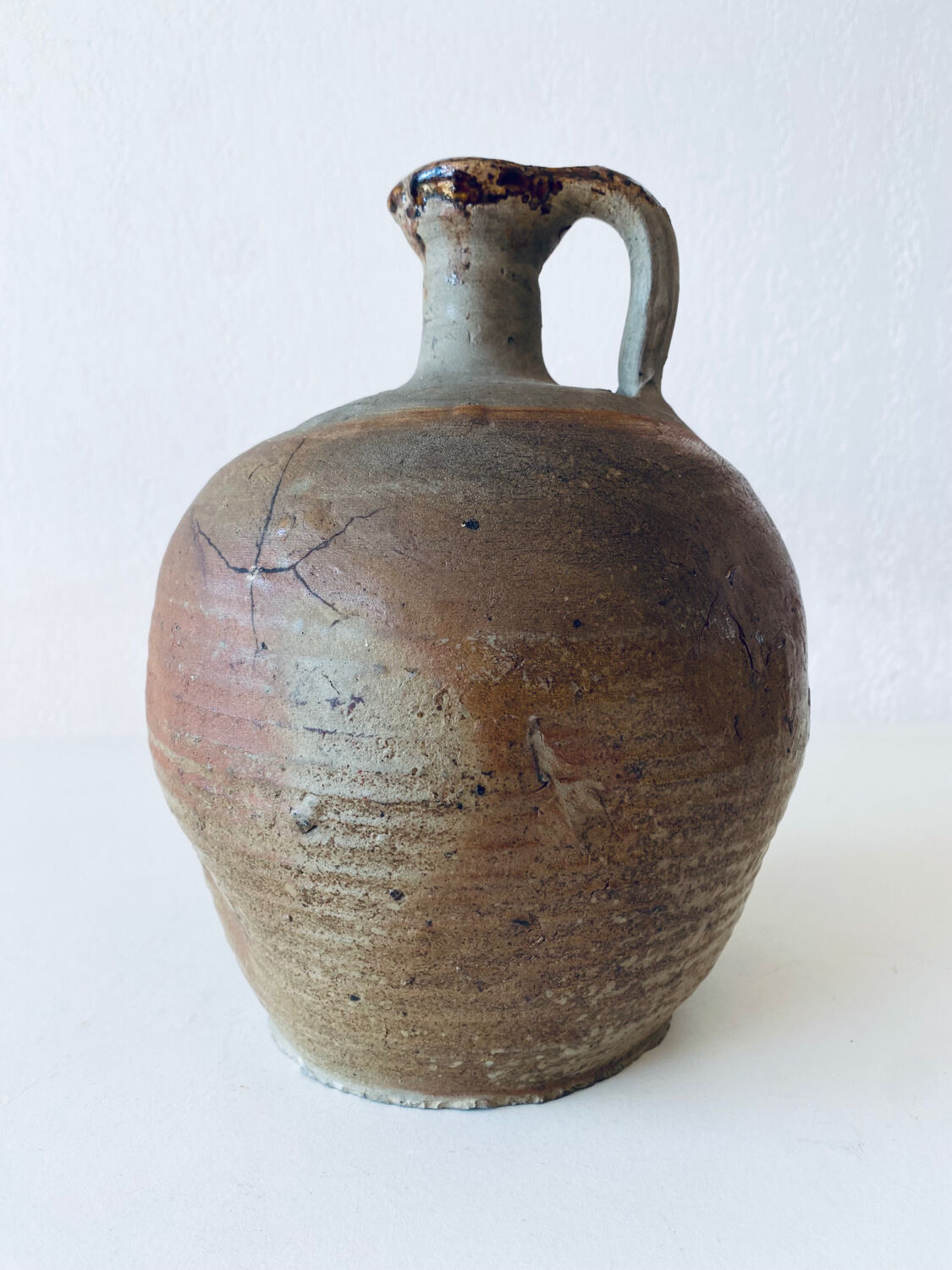 Antique terracotta jug