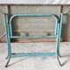 Old metal folding table with its original turquoise patina