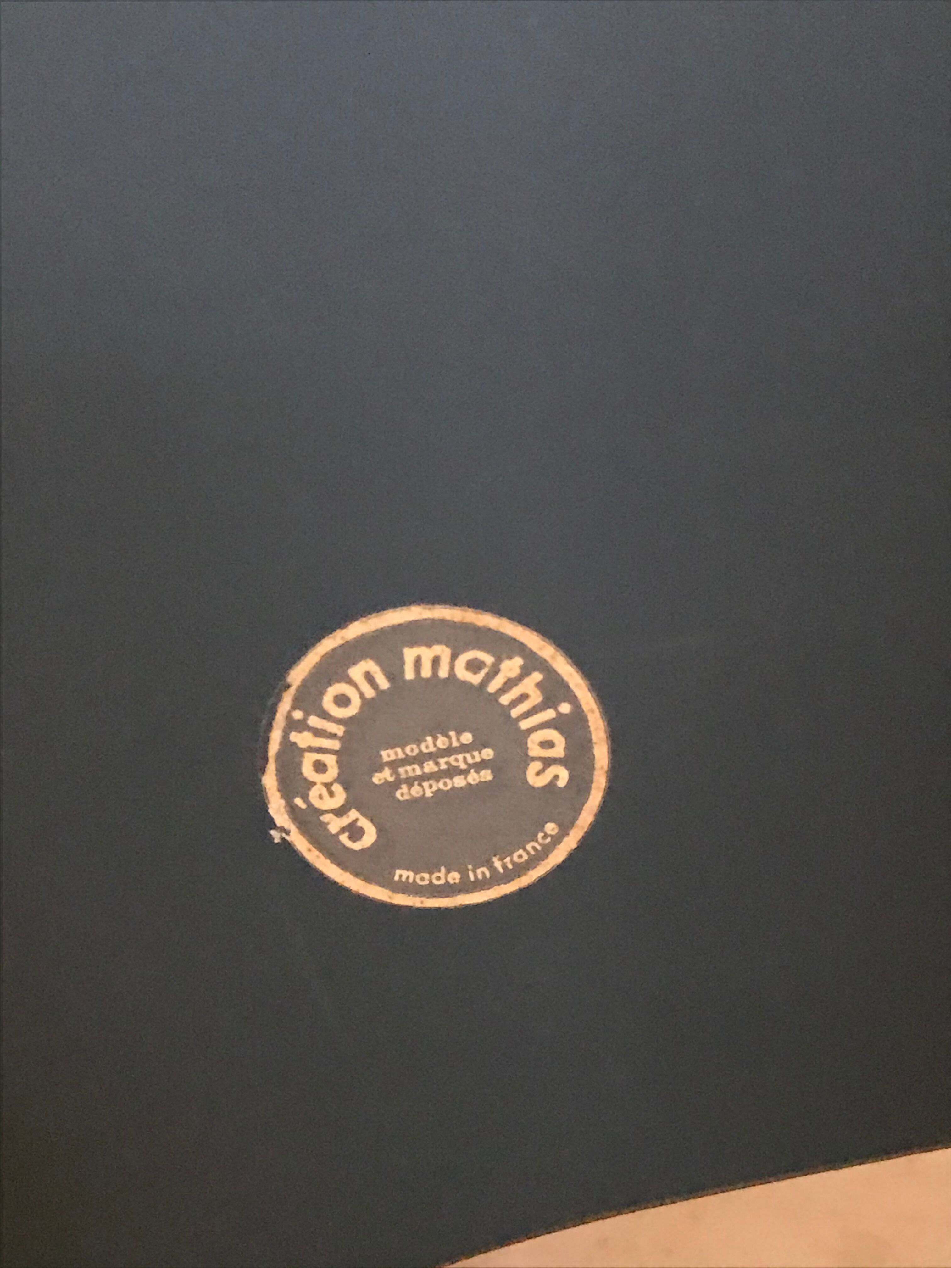 Free-form mirror signed Mathias 55x59cm