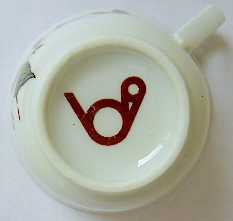 Six coffee cups and their porcelain undercups from Sologne