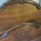 Louis XV style bed in carved walnut