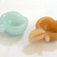 Pair of Apple opalin ashtrays