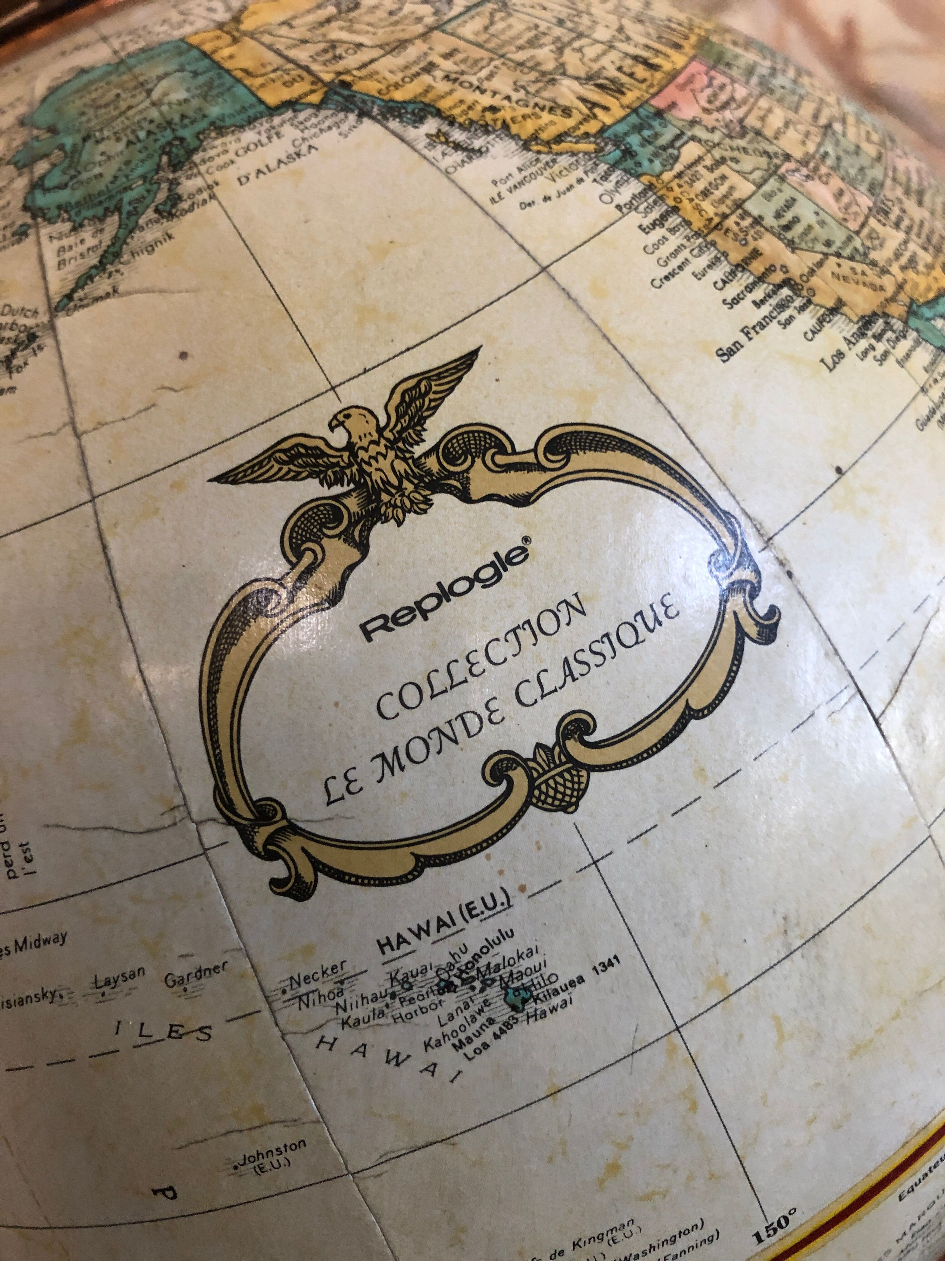 Old globe world map with arch + vintage wood base