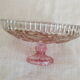 Small pink tinted molded crystal display cup