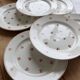 6 vintage flat plates from Nimy with red patterns.