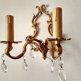 Rococo-style wall lamp in gilded bronze and crystal stamps