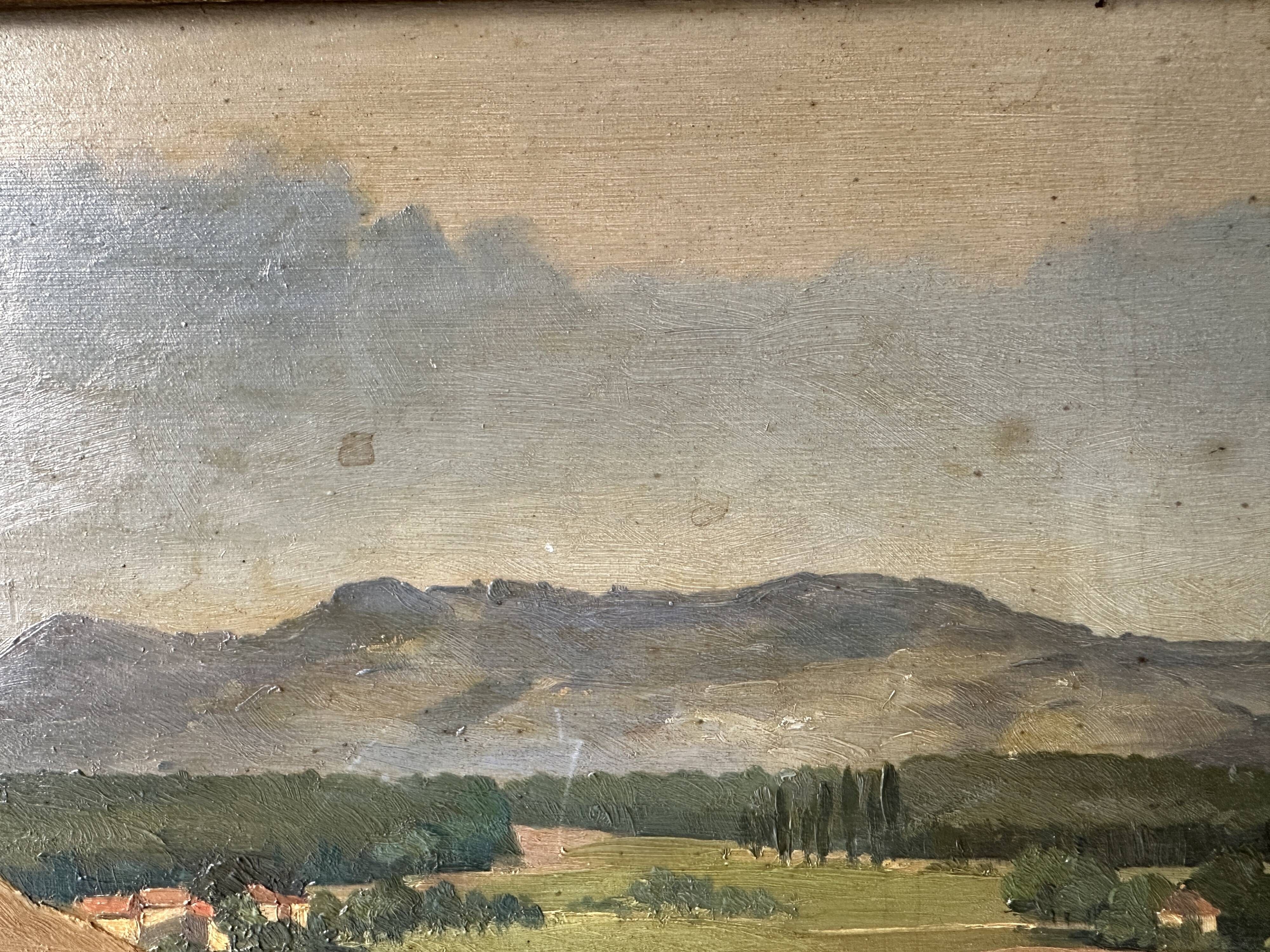 Old oil painting of a landscape on panel from 1920, haystacks.