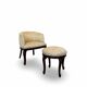 An antique Italian bar chair and a matching tufted vanity stool.