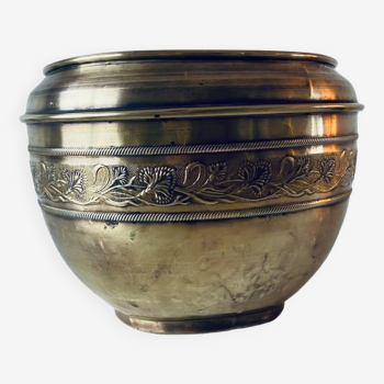 Old brass pot cover