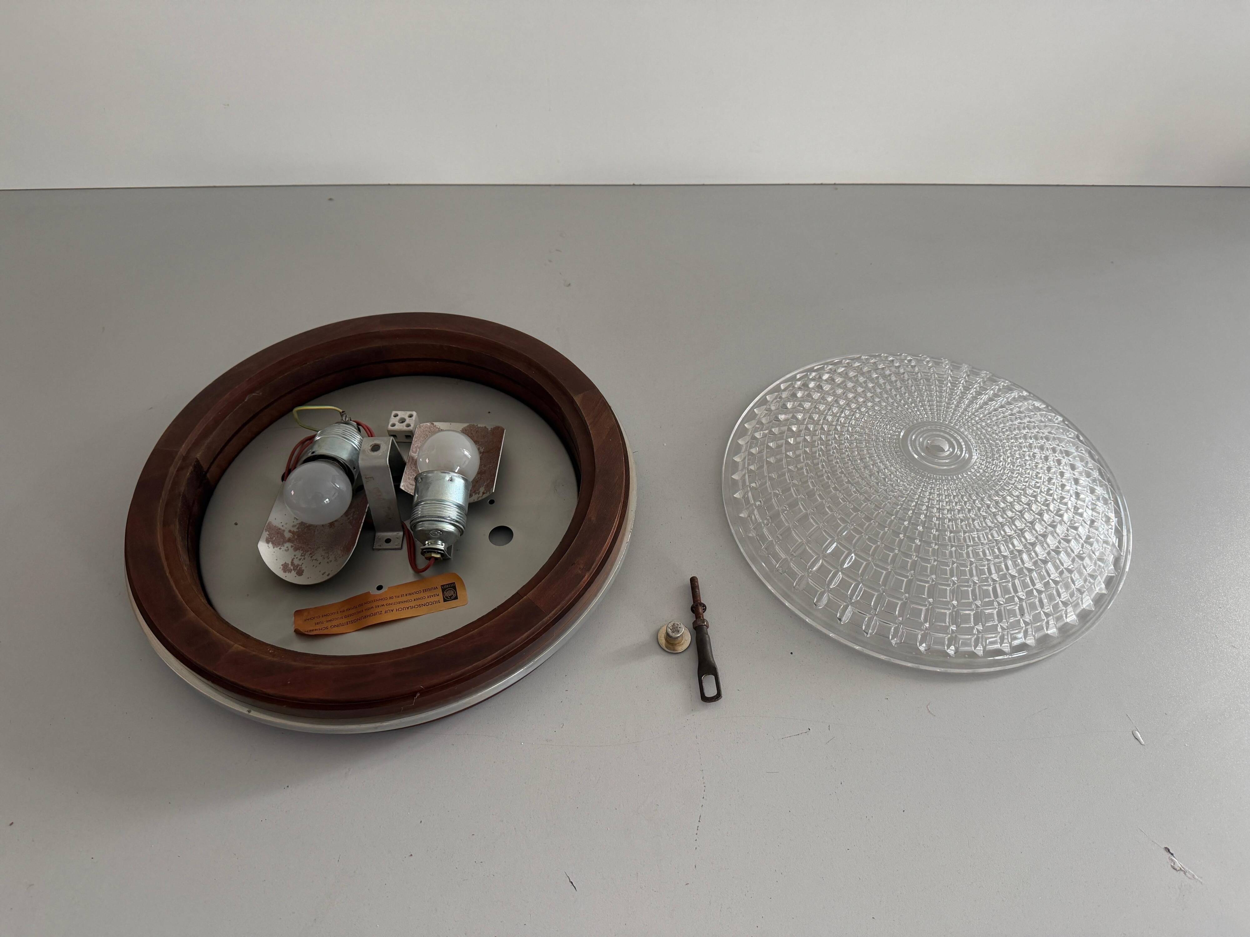 Flush mount in glass crystal and mahogany wood base, 1960s, Switzerland