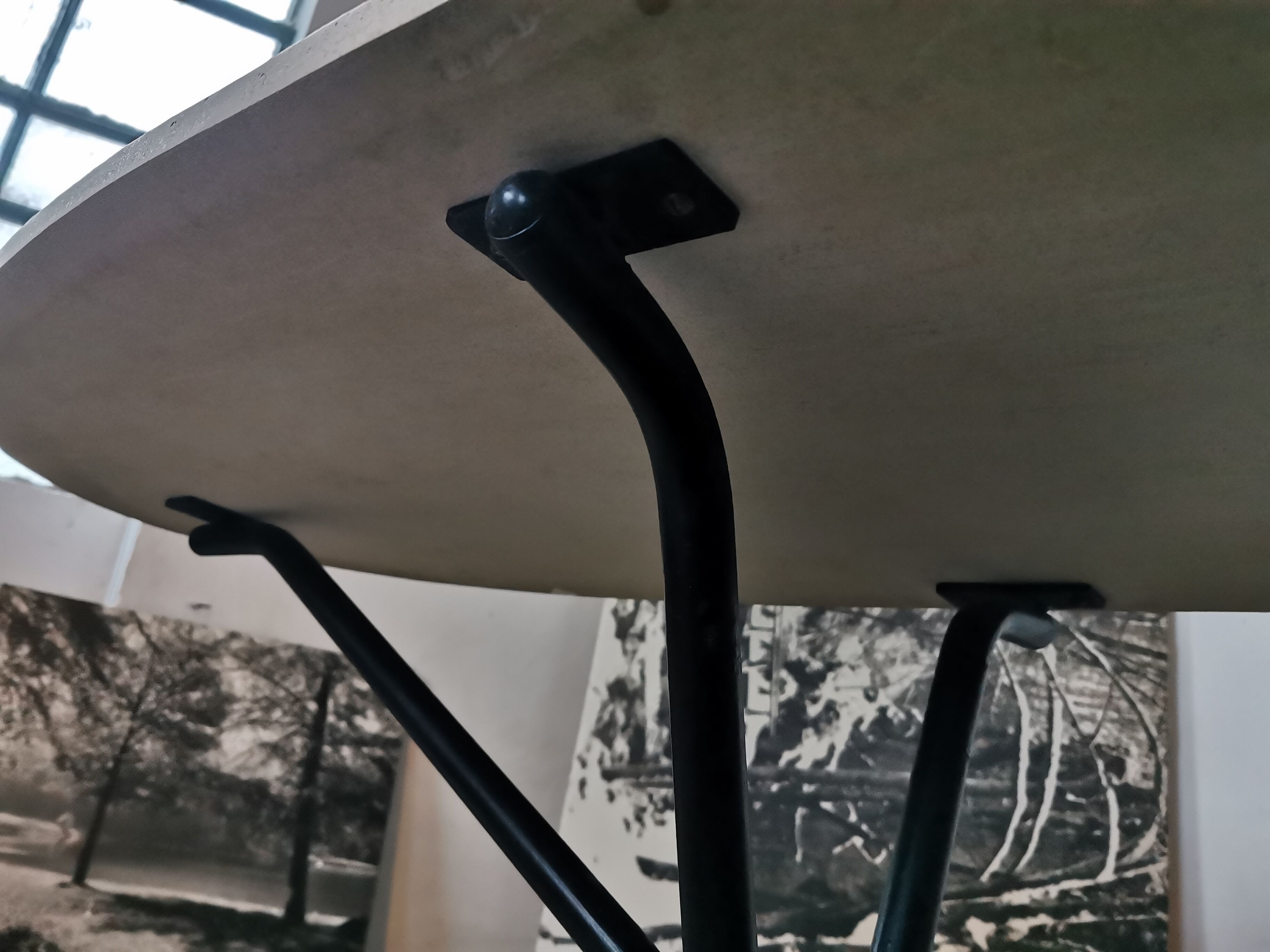Large oval coffee table in travertine and metal