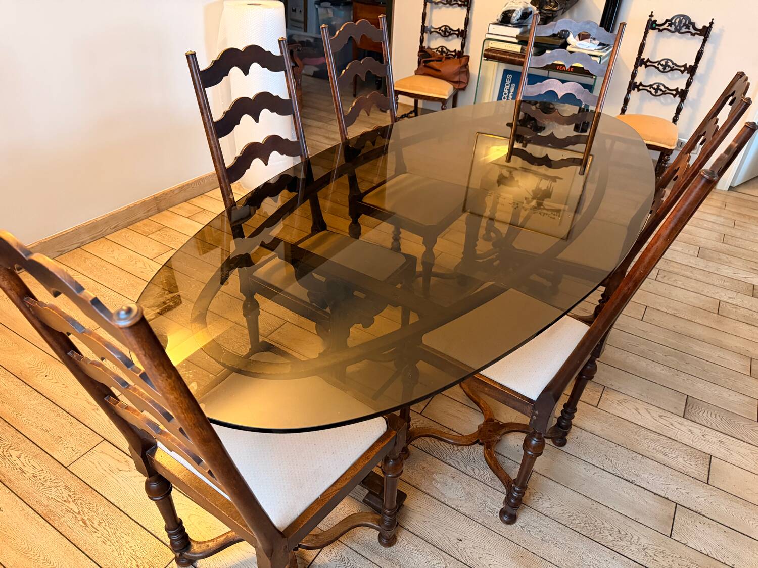 Large antique dining table in wrought iron and smoked glass,