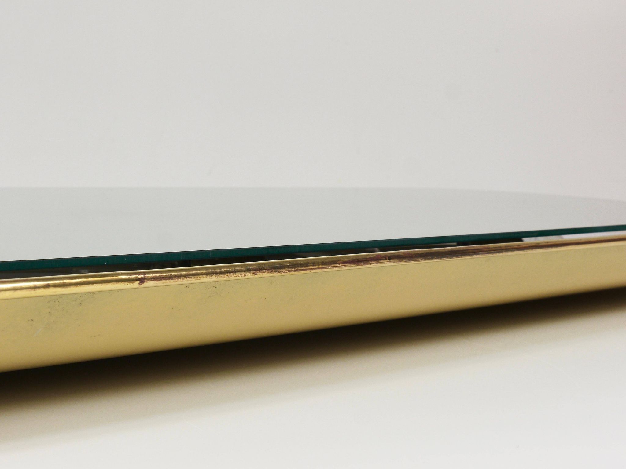 Mid-century illuminated wall mirror by Ernest Igl with brass crown, by Hillebrand.