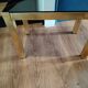 Vintage nesting table in gold metal and smoked mirror glass