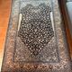 Grand tapis persan bleu