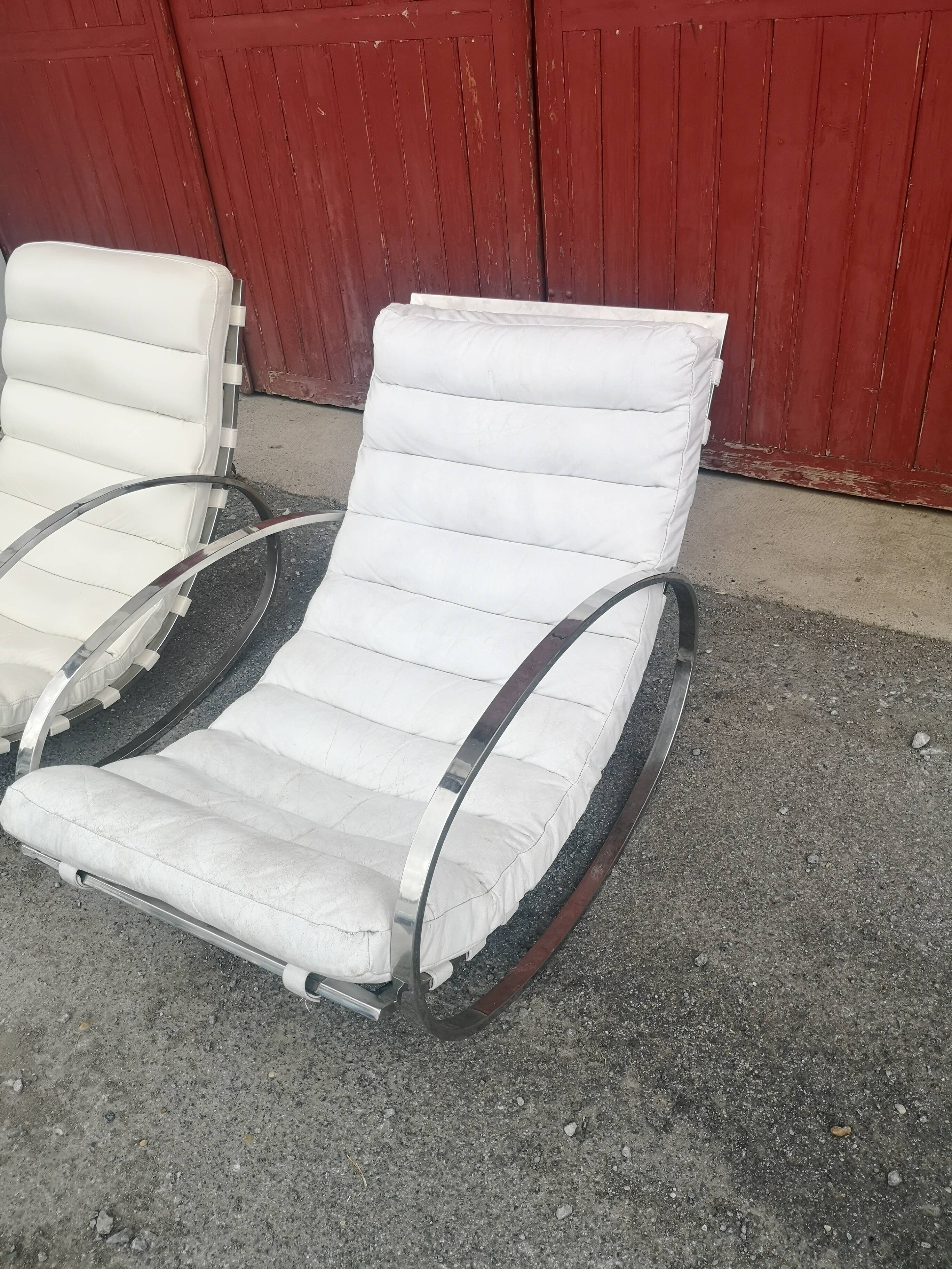 Pair of vintage chrome and leather rocking chairs
