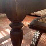Wooden and straw meridian with foot rest.