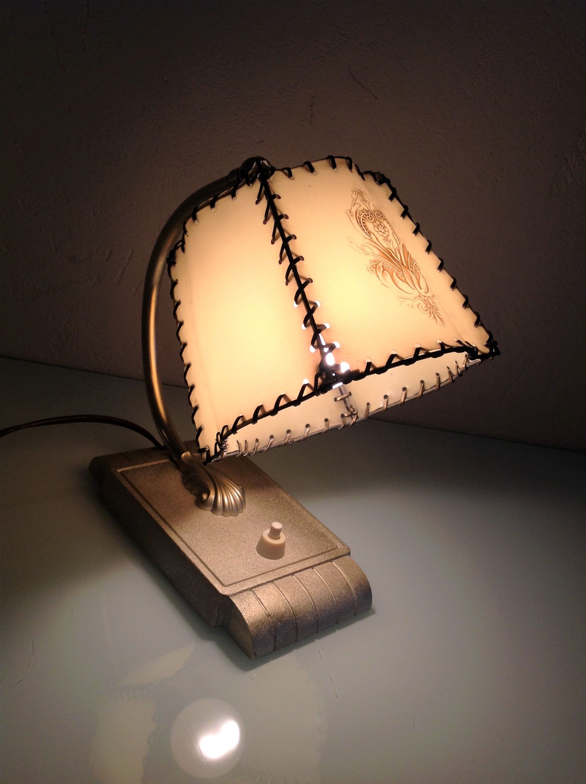 Brass bedside lamp and beige lampshade art deco style