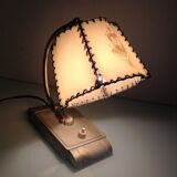 Brass bedside lamp and beige lampshade art deco style