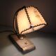 Brass bedside lamp and beige lampshade art deco style