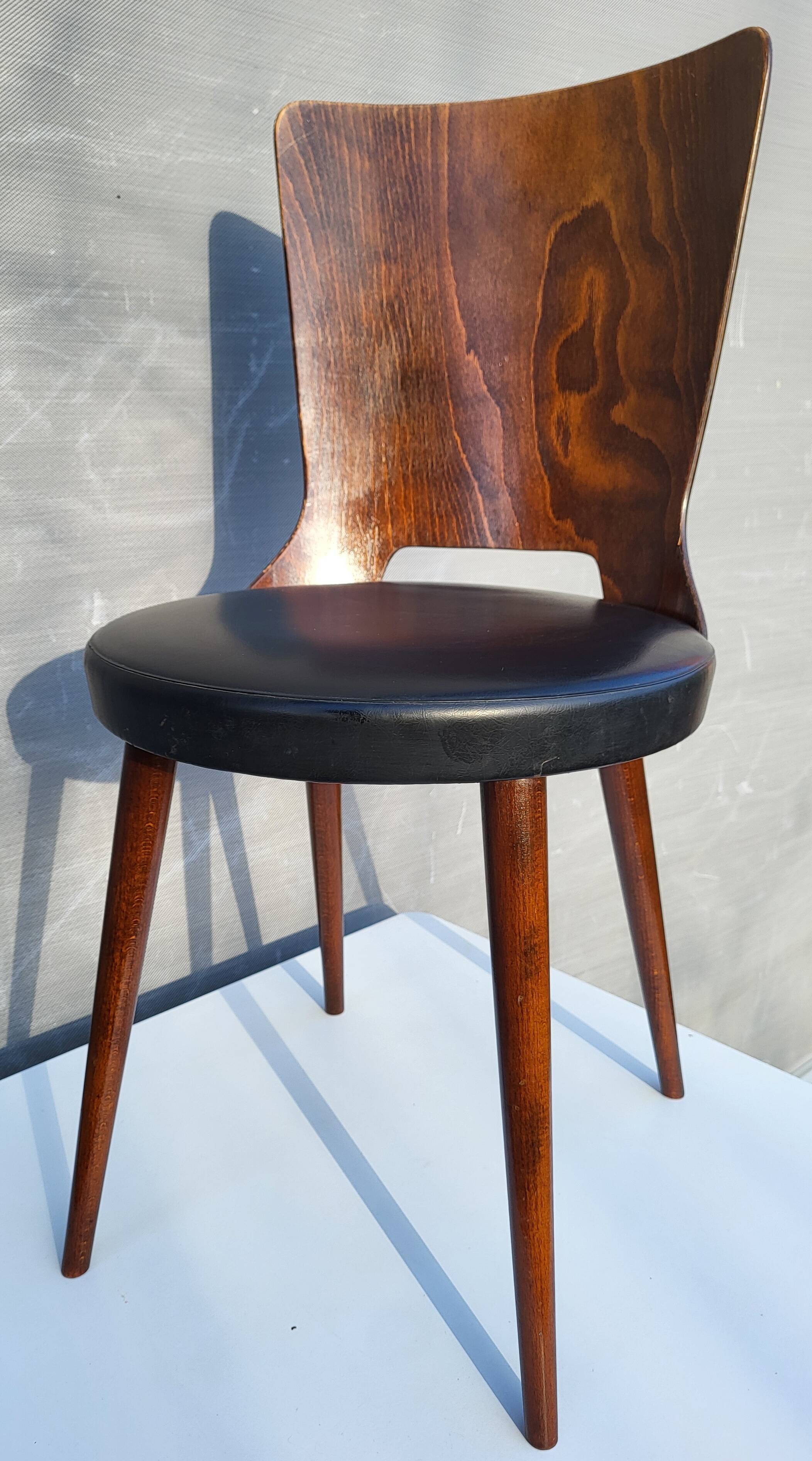 Pair of Dove chairs • Baumann • Black faux leather