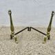 Pair of Neo-classical andirons, in solid bronze, 1920s-1930s.