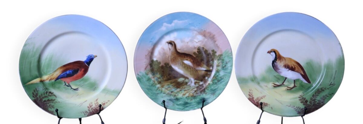 3 decorative porcelain plates from Limoges featuring partridges and pheasants.