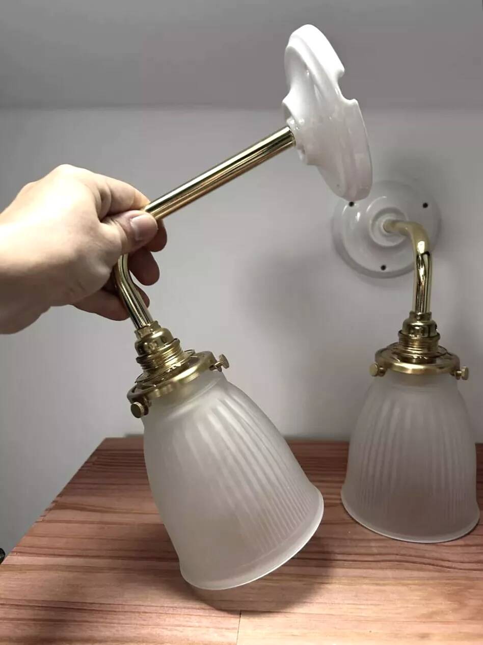 Pair of ribbed glass wall sconces